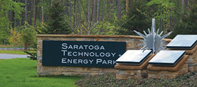 Saratoga Technology Energy Park sign behind art installation at the park.