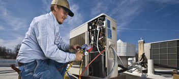 Technician working at electric box