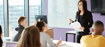 Instructor in front of classroom