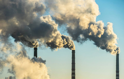 Greenhouse gases being emitted into atmosphere