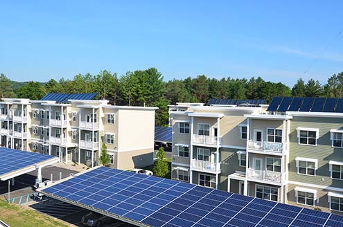 NetZero Village - solar panels and housing units 