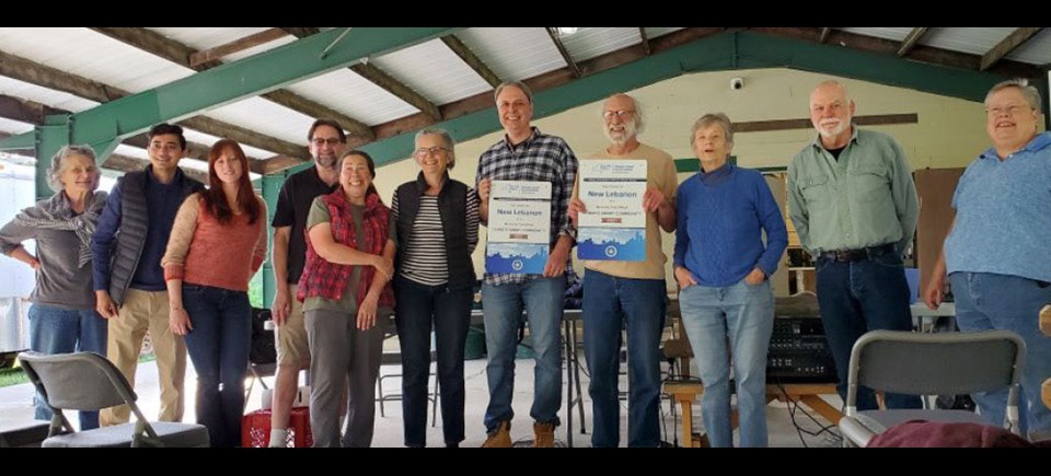 Group from New Lebanon posing with award certificates.