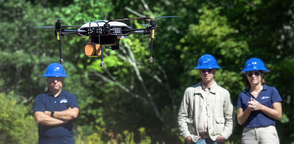 Manifold Robotics technicians observing a drone