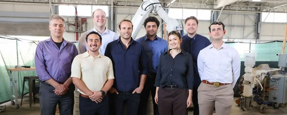Group of people posing for a photo.
