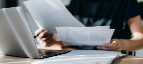 A woman holding papers