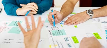 Team members's hand at meeting