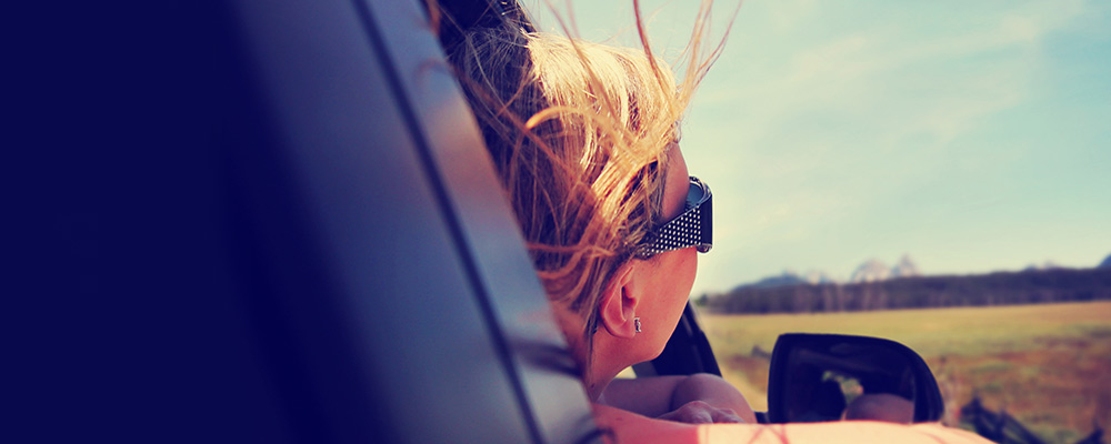 woman in car window