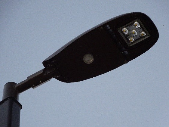Image of streetlight, close up view from underneath. 