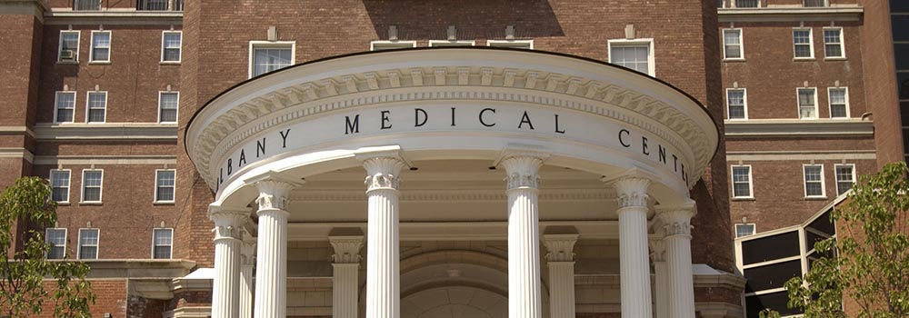 Pillars in front of Albany Medical Center building entrance.