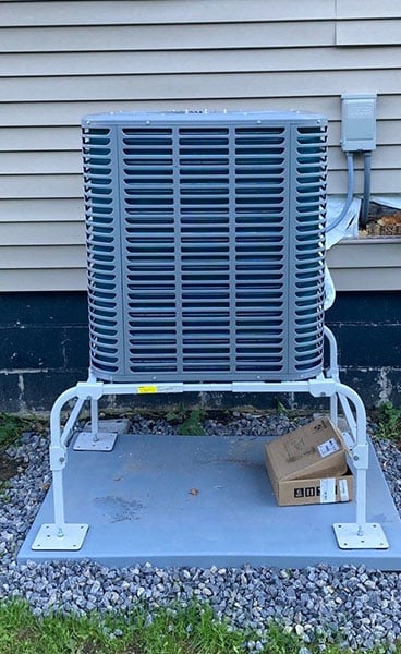 Air source heat pump five ton condenser unit.