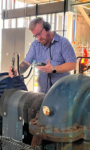 Matt Vilardebo working with equipment.