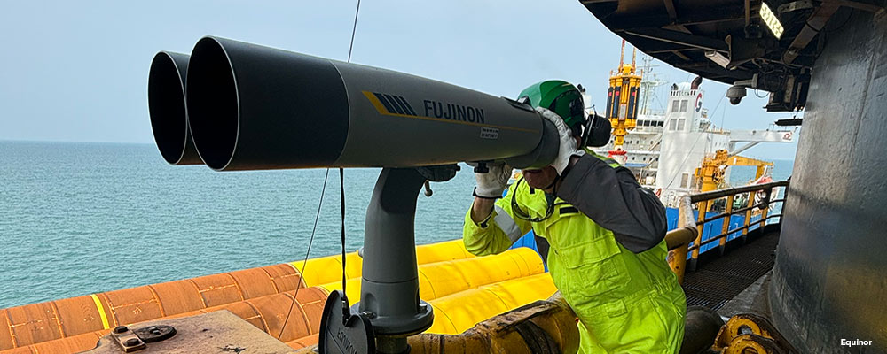 Binoculars on offshore wind site